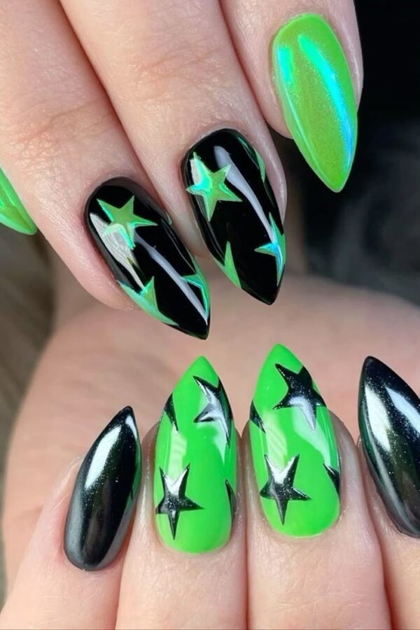 Nails designed with a "floating in space" theme, featuring celestial elements against a dark background. #spacenails #celestialnails #nailart