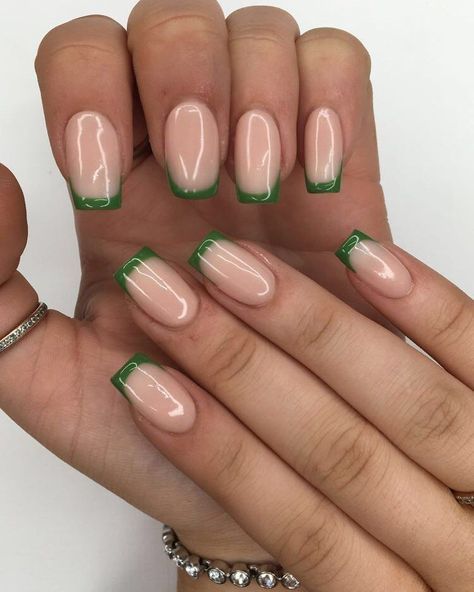 A mix of solid green and French manicure nail designs. #greennails #frenchnails #mixedmani