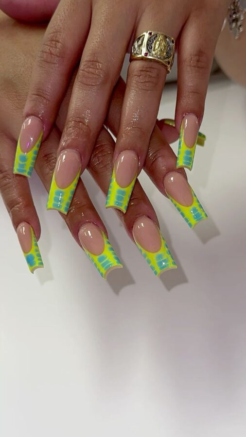 Yellow and green French manicure, a colorful twist on a classic style. #frenchnails #yellownails #greennails