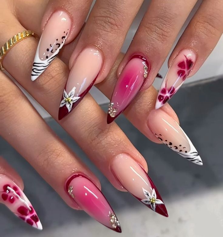 Delicate and fresh: These floral French tips feature a classic French manicure with a touch of spring.  Tiny blooms adorn the tips of each nail, adding a feminine and elegant touch. #FloralFrenchTips #FrenchManicure #FloralNails #SpringNails #NailArt #ElegantNails #FeminineNails