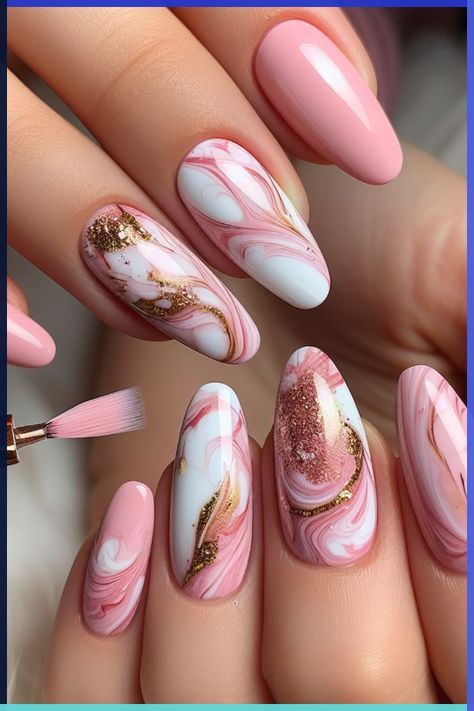 Luxurious marble effect nails featuring swirling patterns in soft and bold tones, creating an elegant and trendy look perfect for baddie nail ideas.