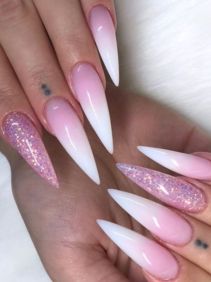 A modern twist on a classic: these ombre French stiletto nails blend soft pinks and whites for a sophisticated gradient effect.

 1  #OmbreNails #FrenchStilettoNails #StilettoNails #GradientNails #NailArt #ModernManicure #NailDesign