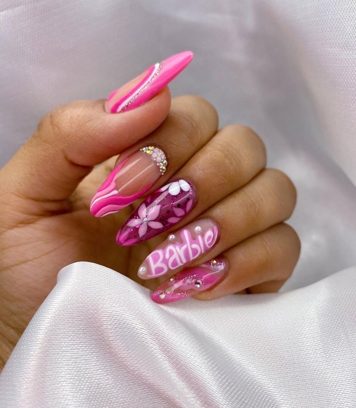 Embrace the Barbiecore trend with these cute and playful pink nails! This vibrant manicure is perfect for adding a touch of fun and femininity to your look. #BarbiecoreNails #PinkNails #CuteNails #NailArt #TrendyNails