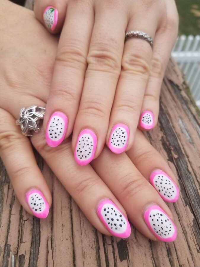 A refreshing summer look! These nails feature a vibrant design inspired by dragon fruit, perfect for adding a touch of tropical flair to your style. #DragonFruitNails #SummerNails #FruityNails #NailArt #TropicalNails