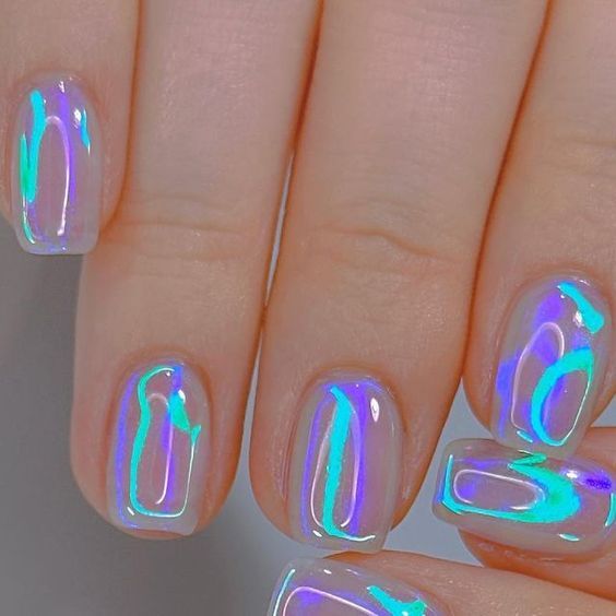 A unique and eye-catching holographic nail look, perfect for a statement manicure. #FlakieMani #NailArtInspiration #StatementNails #TexturedShine