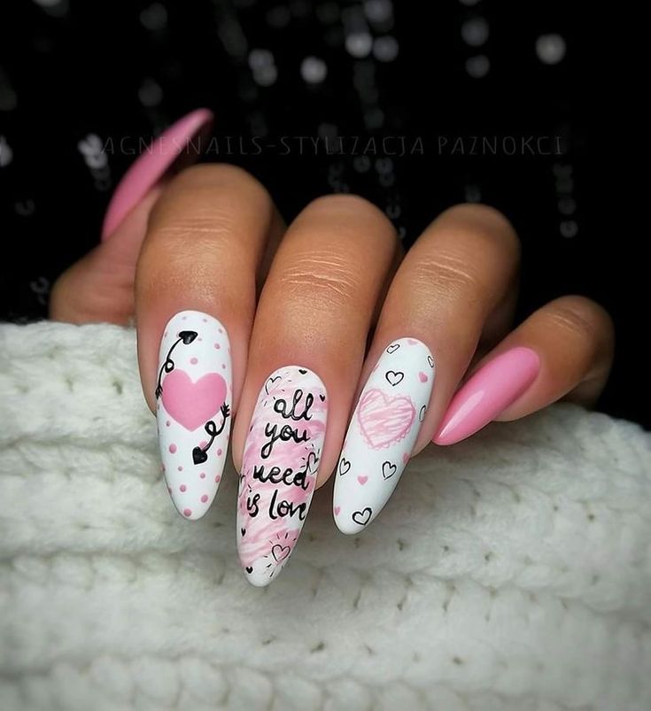 Matte nails adorned with delicate "love letter" script.