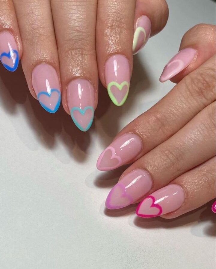 A hand displays minimalist negative space nail art, showcasing a chic and understated design. #NegativeSpaceNails #MinimalistNails #NailArt #ChicDesign