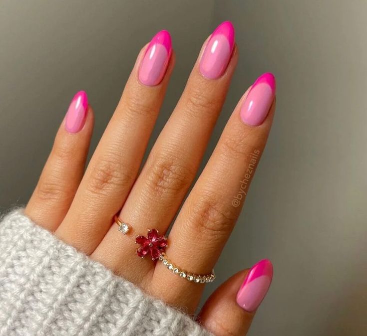  classic French manicure gets a modern twist with this pink-on-pink design. The nails are a soft pink with a slightly darker pink tip, creating a subtle and elegant look.