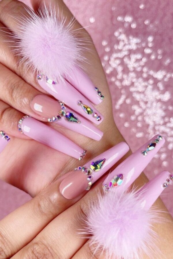 Sparkling Valentine's Day nails adorned with dazzling rhinestones.