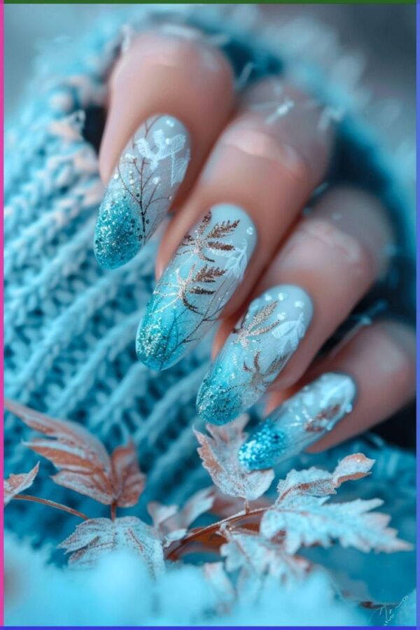 A hand displays nails with snowflake designs and icy blue colors, capturing the magic of winter. #WinterNails #SnowflakeNailArt #NailArt #IcyBlue