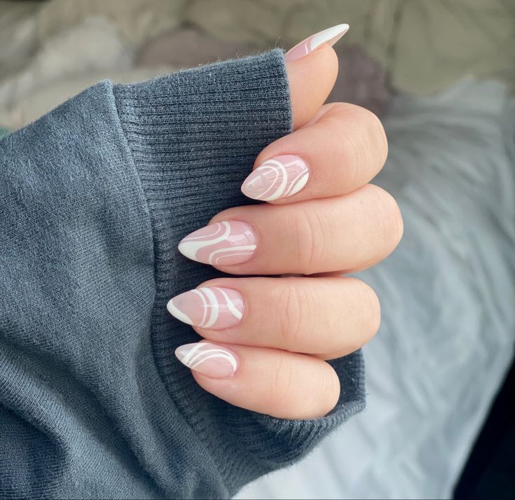 nail with delicate, thin white lines painted on it