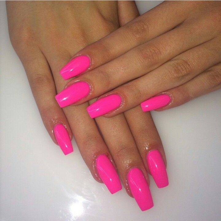 Electrify your look with these vibrant neon pink nails.  This bold manicure is perfect for making a statement. #NeonPinkNails #HotPink #NailArt #BrightNails