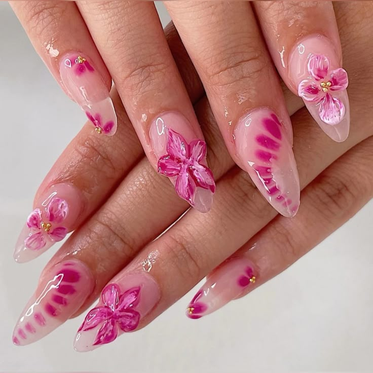 Add a touch of dimension to your spring manicure with these eye-catching 3D floral nail designs. #3DNailArt #DimensionalNails #SpringTrends