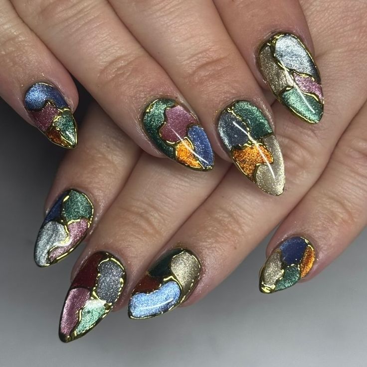 Playful and vibrant, these abstract nails capture the spirit of Mardi Gras.