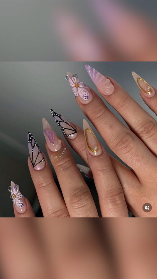 These butterfly wing nails are a unique and eye-catching way to celebrate the arrival of spring. #FunSpringNails #ButterflyWings 