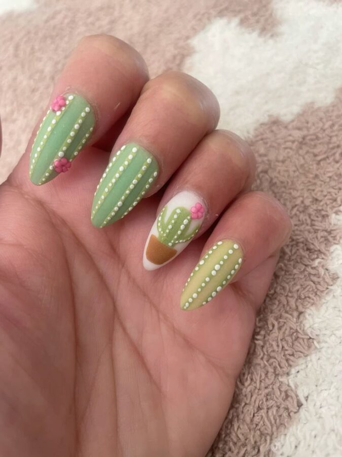 Embrace the desert vibes with these adorable cactus-themed Western nail designs. #westernnaildesigns #cactusnails #desertnails