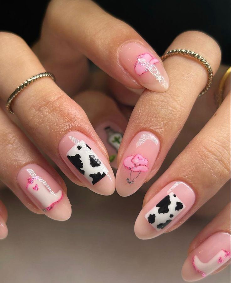 This image showcases nails painted with cowboy boot designs, a fun and stylish Western nail art idea. #westernnaildesignideas #cowboyboots #manicure