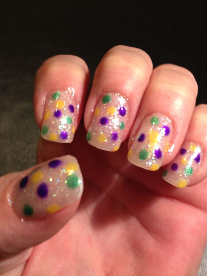 These unique glitter gradient nails are a showstopper for Mardi Gras.