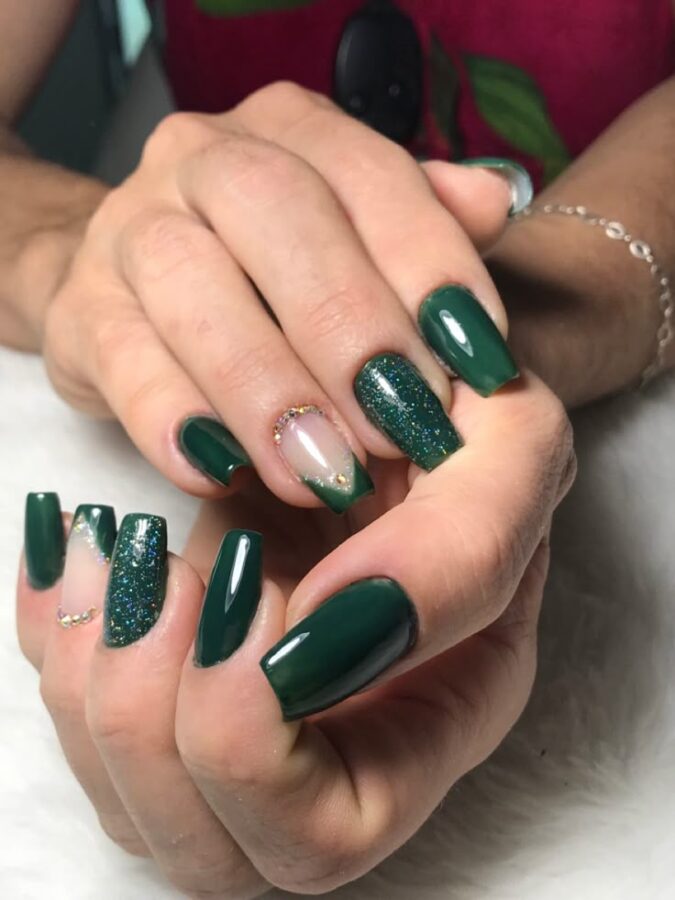 These festive glitter green nails are perfect for celebrating St. Patrick's Day in style. #StPatricksDay #NailDesign #GreenManicure #CelebrationNails #FestiveGlam