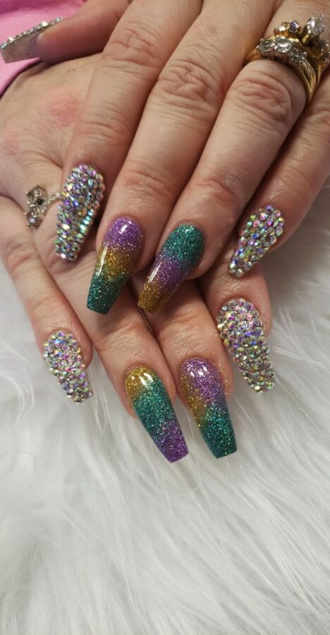 Celebrate Mardi Gras with these dazzling glitter and metallic nails.