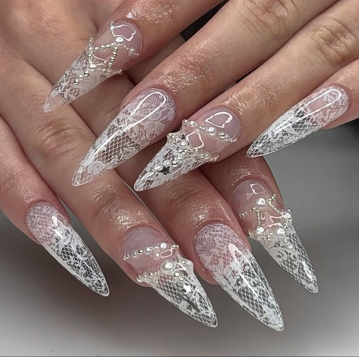 Add a touch of romantic detail to your wedding day with these delicate lace nail art designs. #LaceNailArt #RomanticNails 