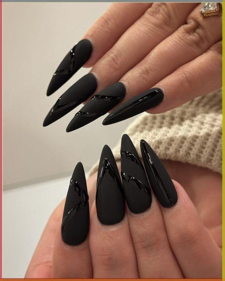 The striking contrast between matte black and glossy accents creates a sophisticated and edgy look on these nails. #matteandglossy #blacknails #nailart