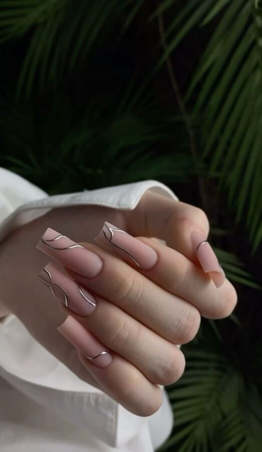 Matte nude nails with metallic details. #mattenails #nudenails #metallicdetails