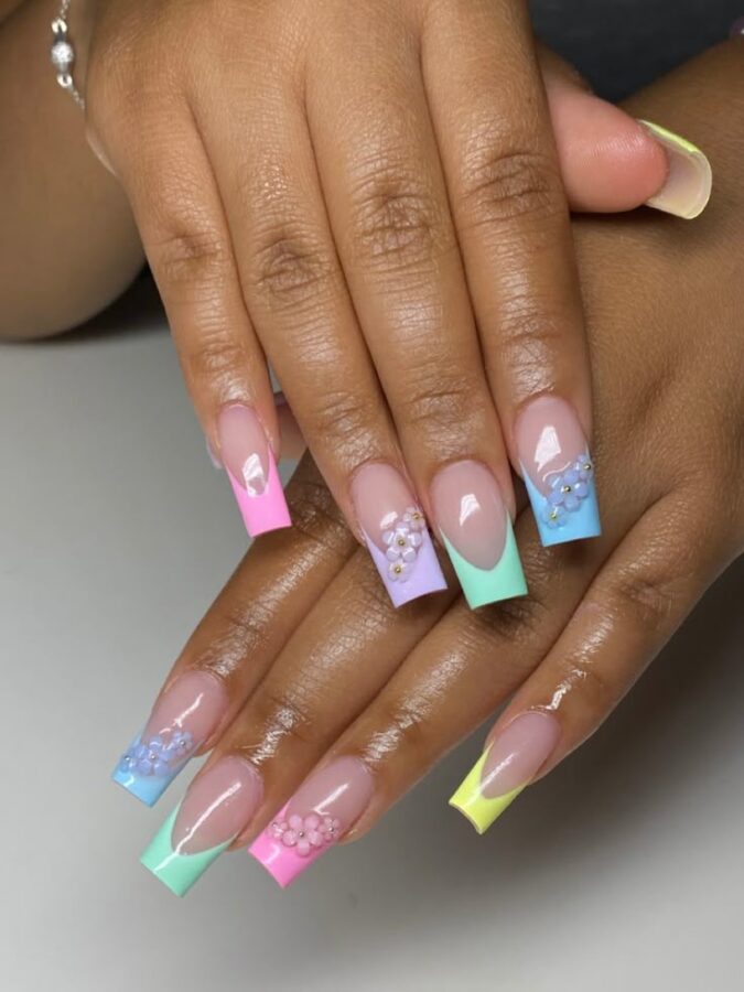 Embrace the spring season with these fresh pastel French tips, a fun take on a classic. #FrenchTips