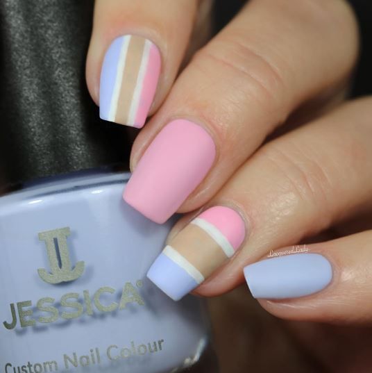 Stay on trend with this chic and modern pastel matte color block nail art. #mattenailideas #colorblockinspo #trendynails