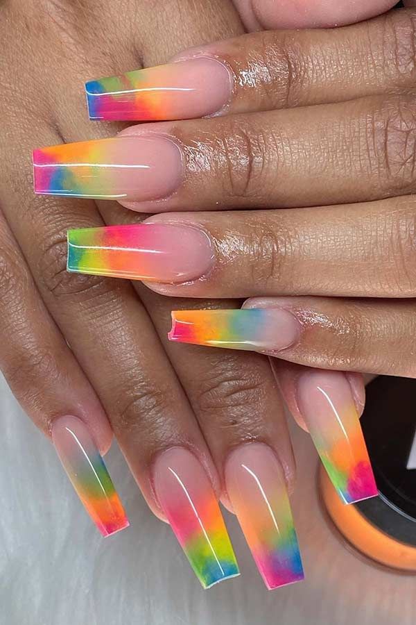 Rainbow nails: a fun and festive choice for your birthday. #RainbowNails 