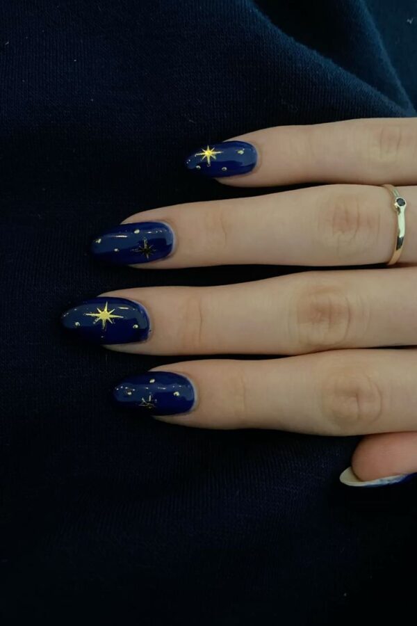 Celebrate your birthday under a magical starry night sky with these captivating nail art designs. #StarryNightNails #MagicalNails #CelestialNails