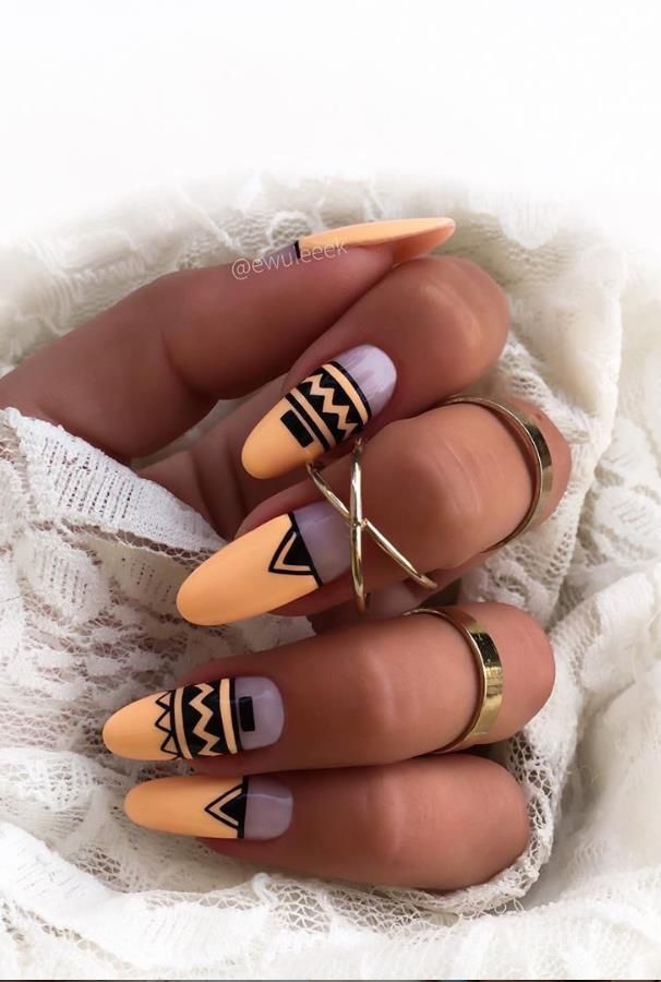 Embrace a Southwestern Western style with these Aztec pattern nail designs. #westernnaildesigns #southwesternstyle #nailart