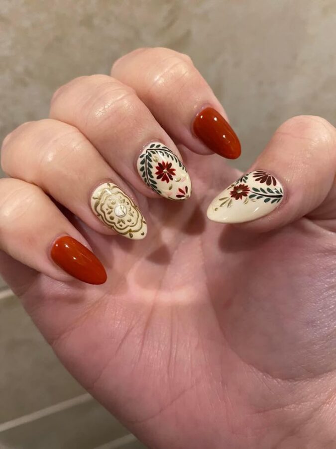 Embrace a bohemian Western style with these floral and paisley nail designs. #westernnaildesigns #boho #nailart